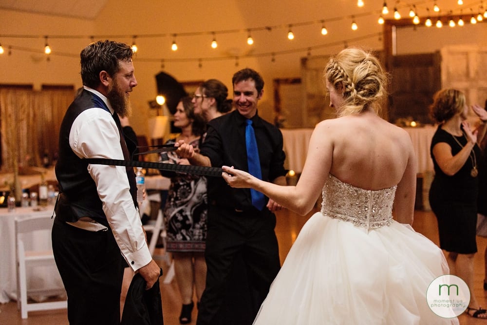 bride snapping suspenders