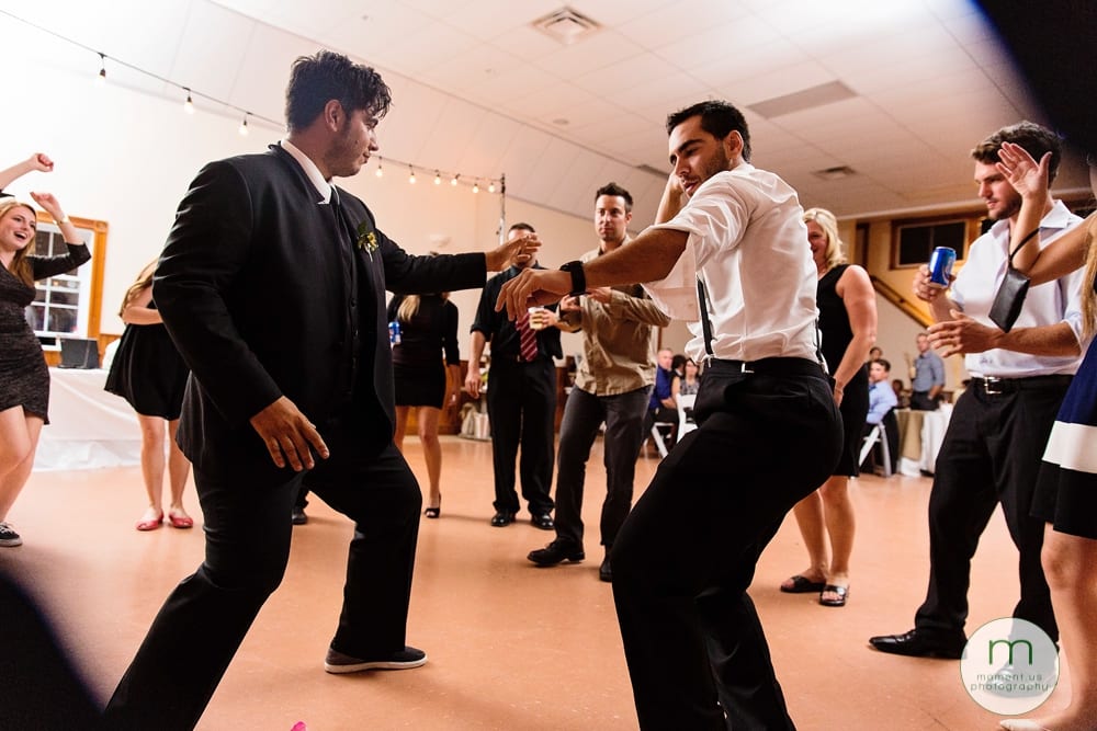 groom dancing with brother