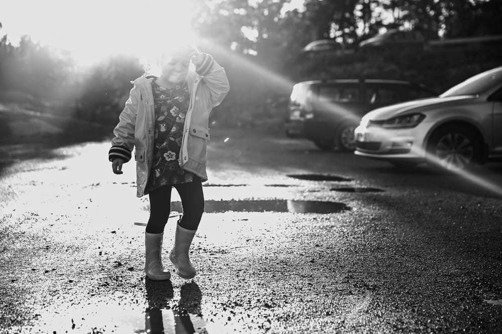Stockholm girl playing in parking lot