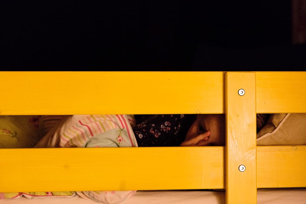 Stockholm girl in bed sucking thumb