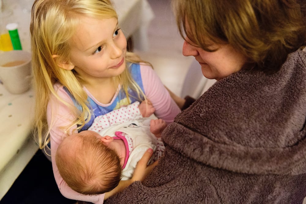 Stockholm sister with mom and baby