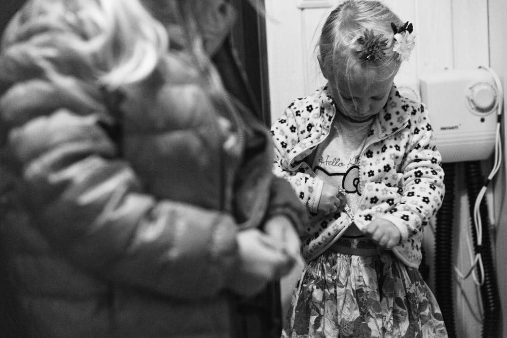 Stockholm girl zipping sweater