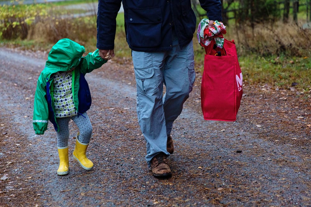 Stockholm girl walking to nursery with dad