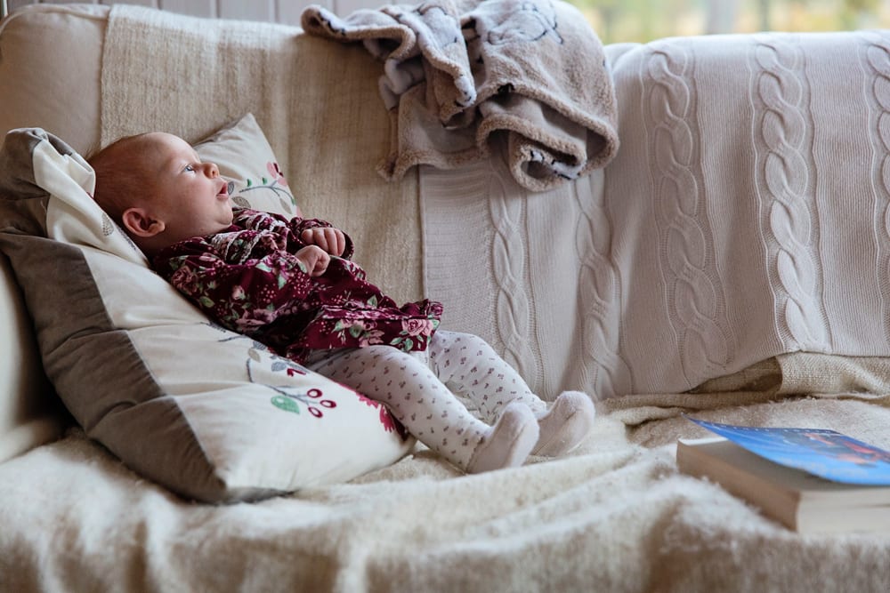 Stockholm baby on couch