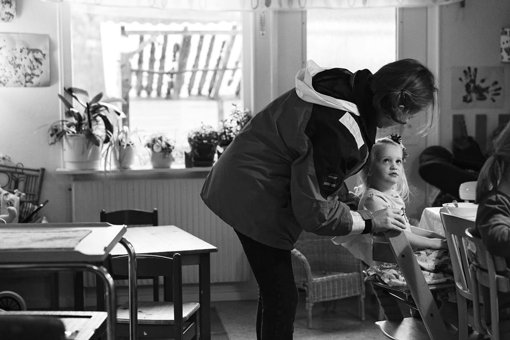 Stockholm mom picking daughter up at school