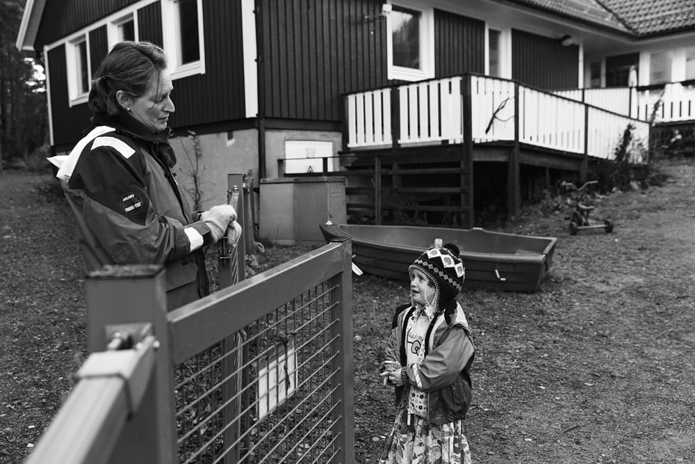 Stockholm girl crying to mom at school gate
