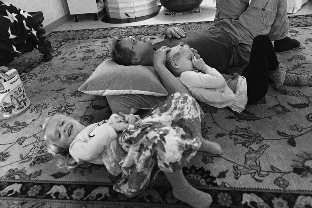 Stockholm family lying on floor