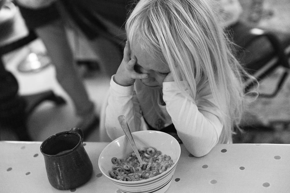 Stockholm girl crying over cereal