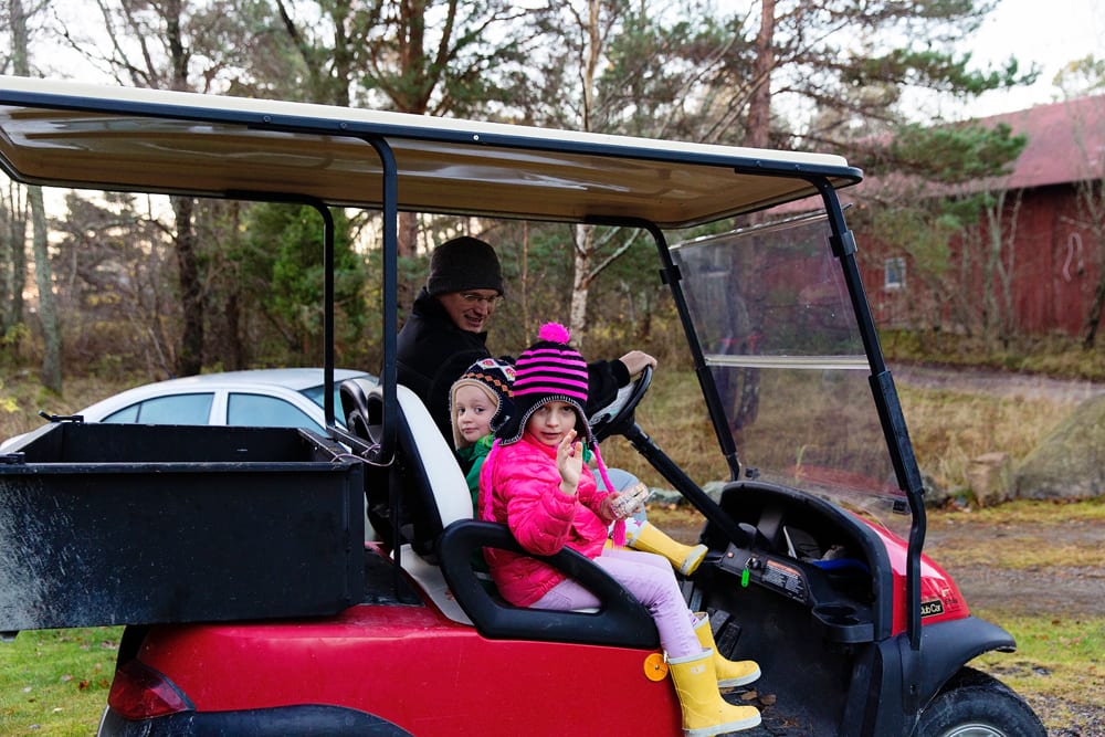 girls leaving for school on golf cart