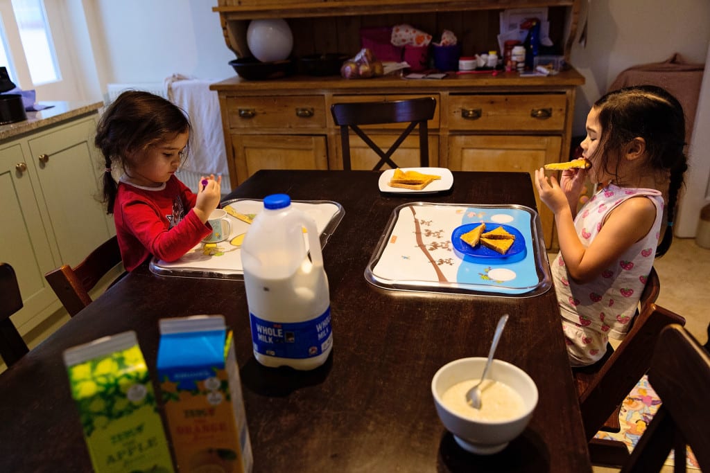 sisters at breakfast table