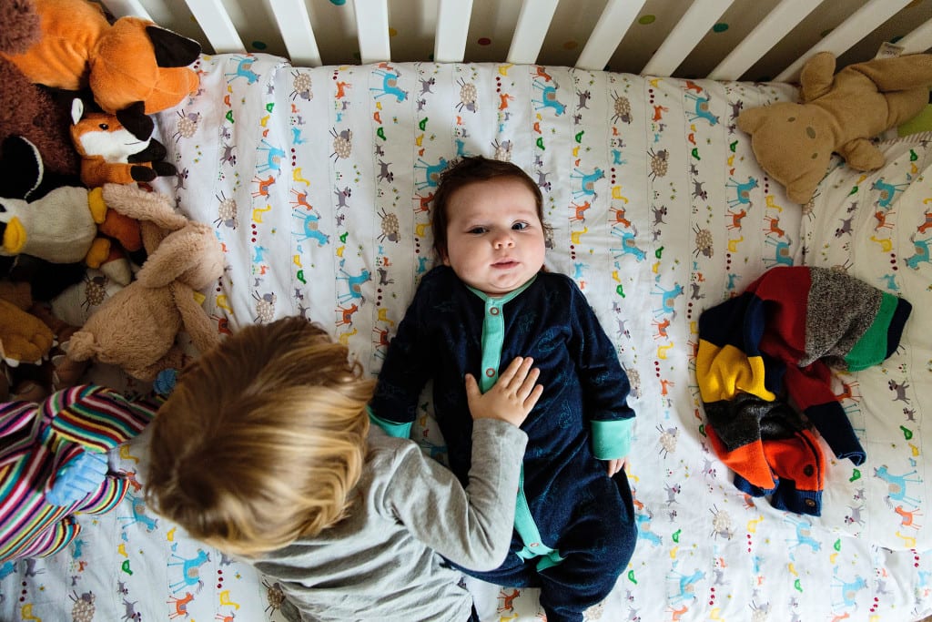 london brothers lying on cot]