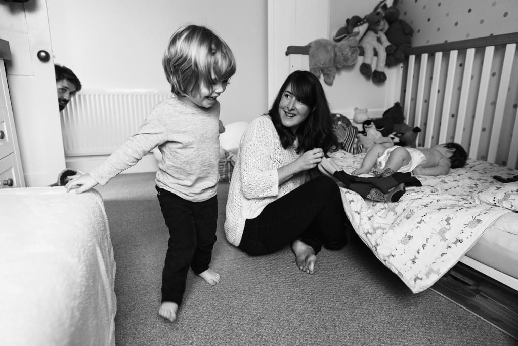 london family playing in nursery