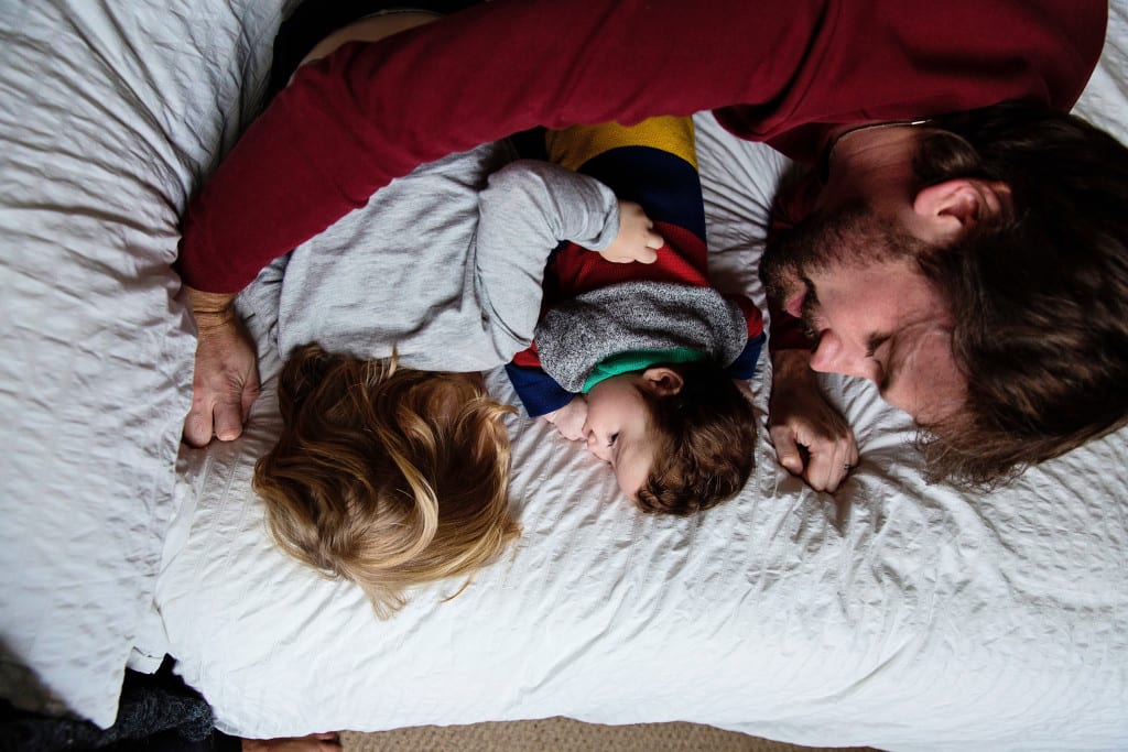 London dad with boy son bed