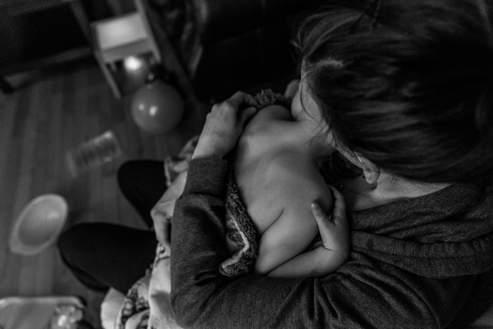 Cornwall family photography - mom cuddling son