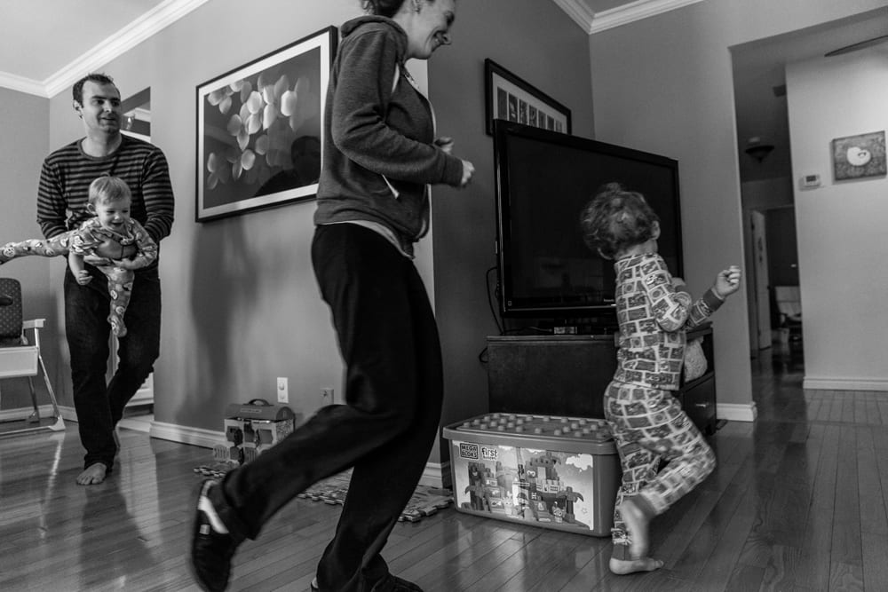 Cornwall family photography - playing chase in the house