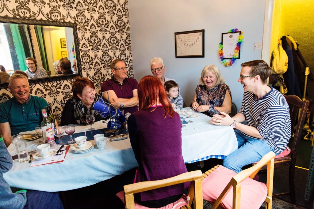 Grandson telling story during Manchester family lunch