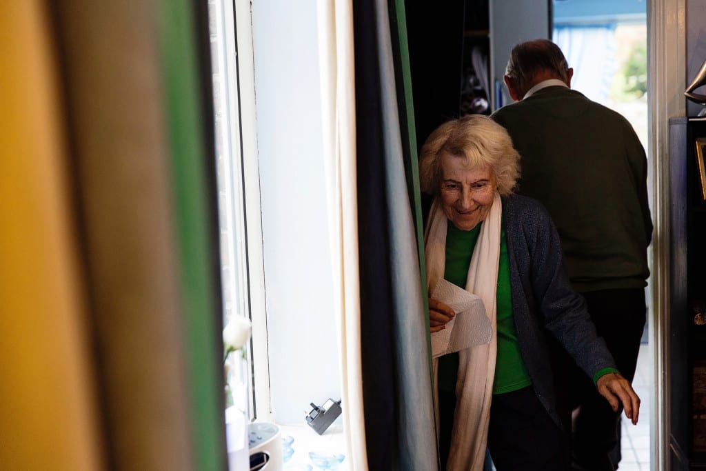 Grandmother hunting spiders during Manchester family lunch