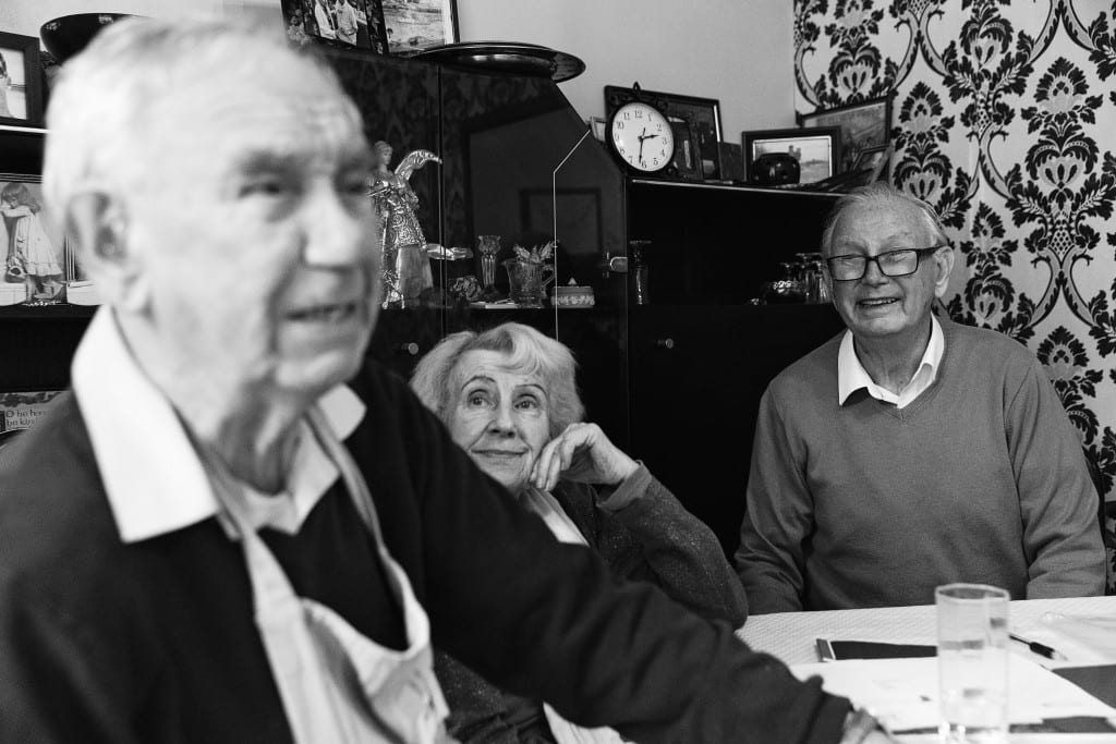 Grandmother looking at husband during Manchester family lunch