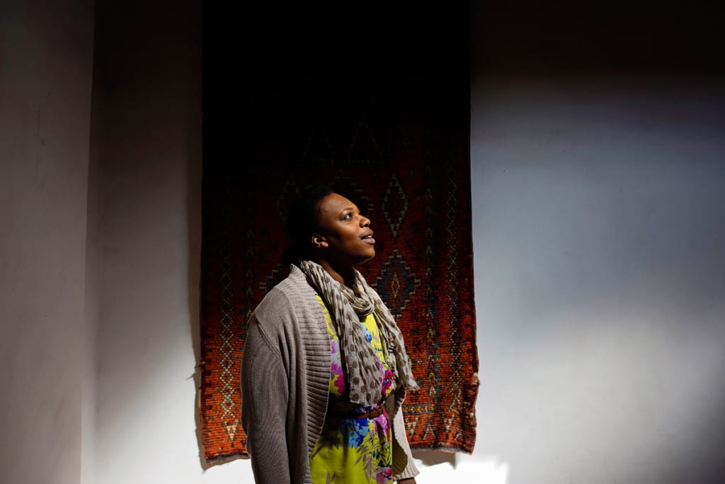 Wedding photographer in Morocco - woman looking at art in museum