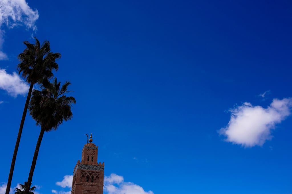 Wedding photographer in Morocco - Koutoubia mosque against blue sky