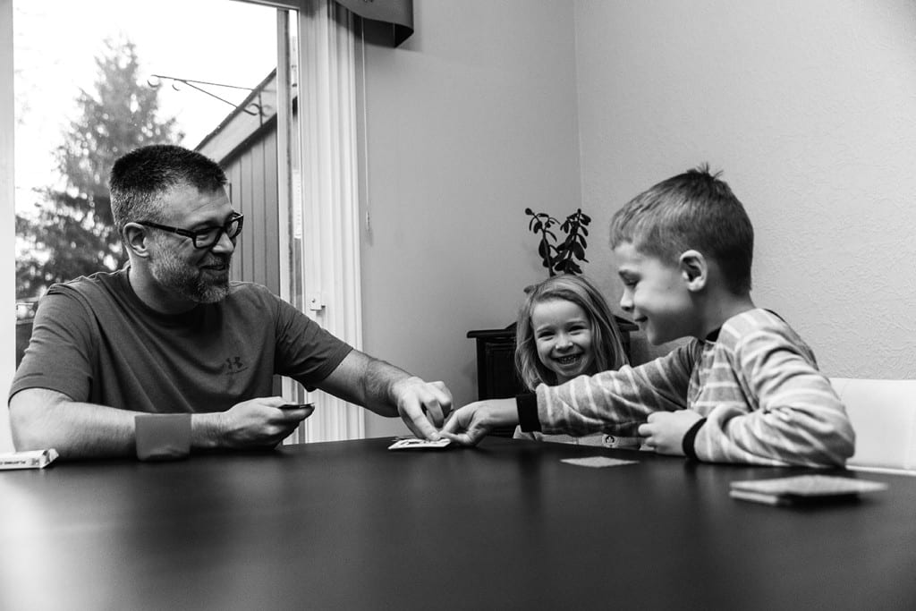 Dad and son play war