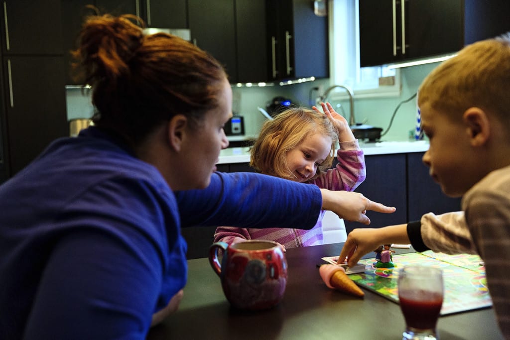 mom and daughter during family game time