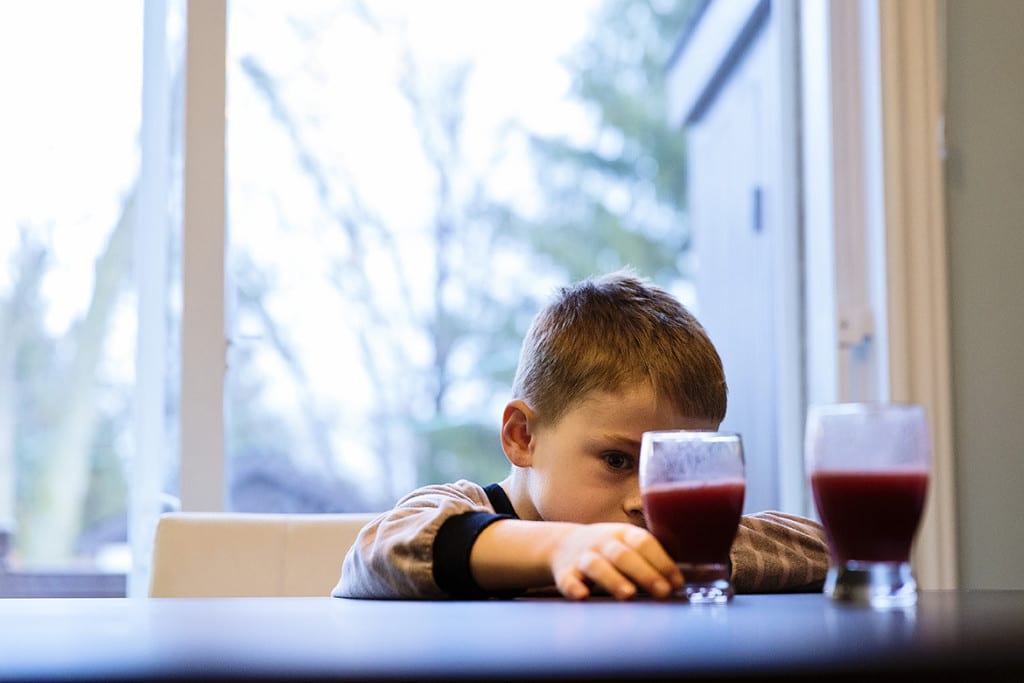 playing with juice glasses