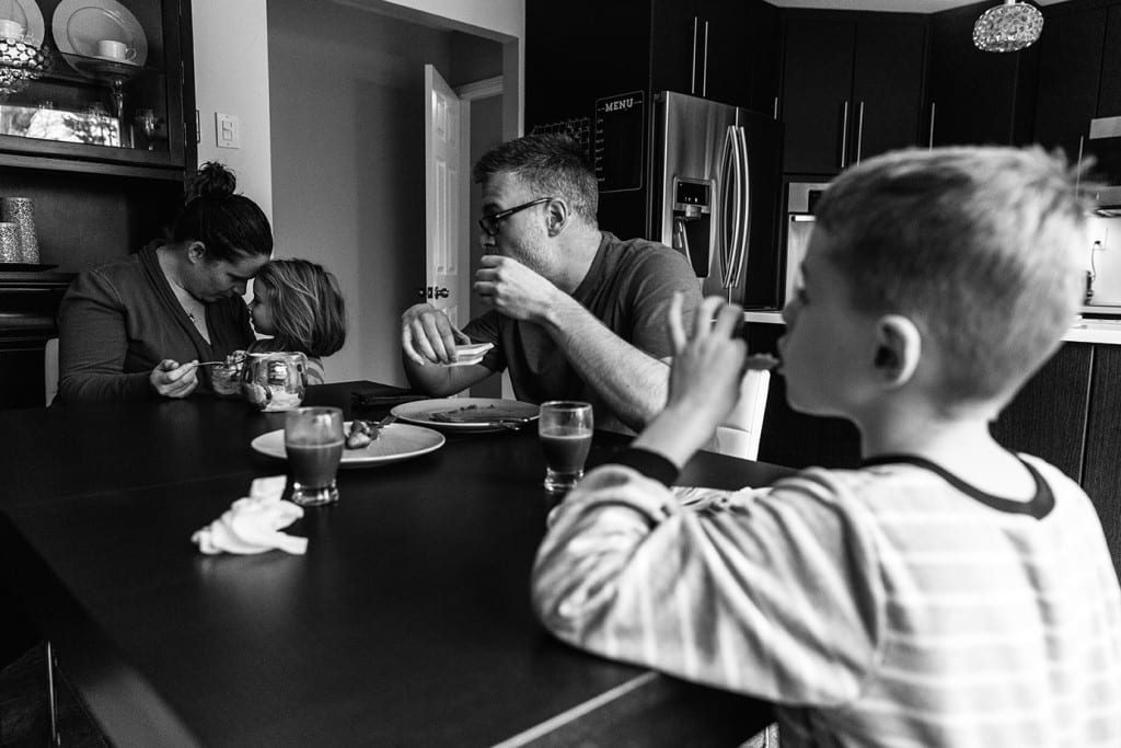 family at breakfast table