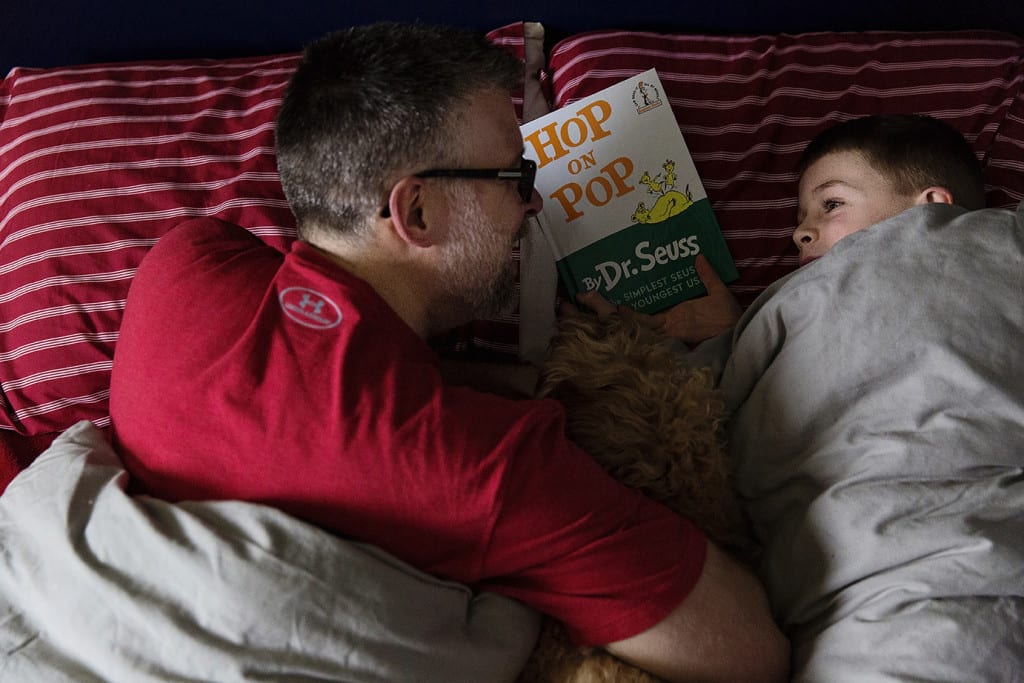 dad and son reading dr seuss