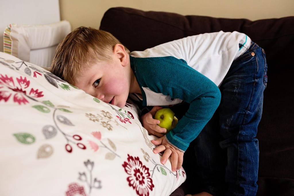 boy eating apple during South Wales family photo session
