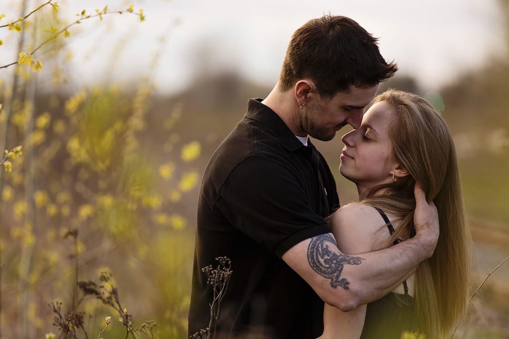 cuddling in tight during Cornwall engagement session