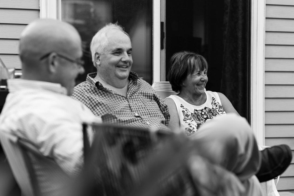 candid family photography of smiling family