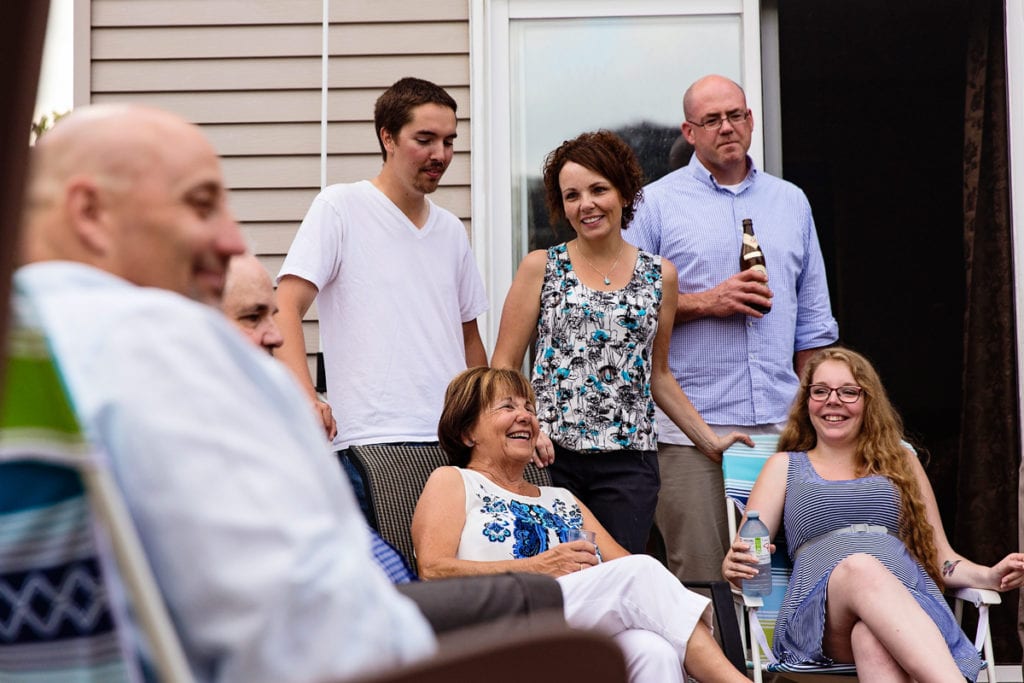 candid family shot on backyard patio