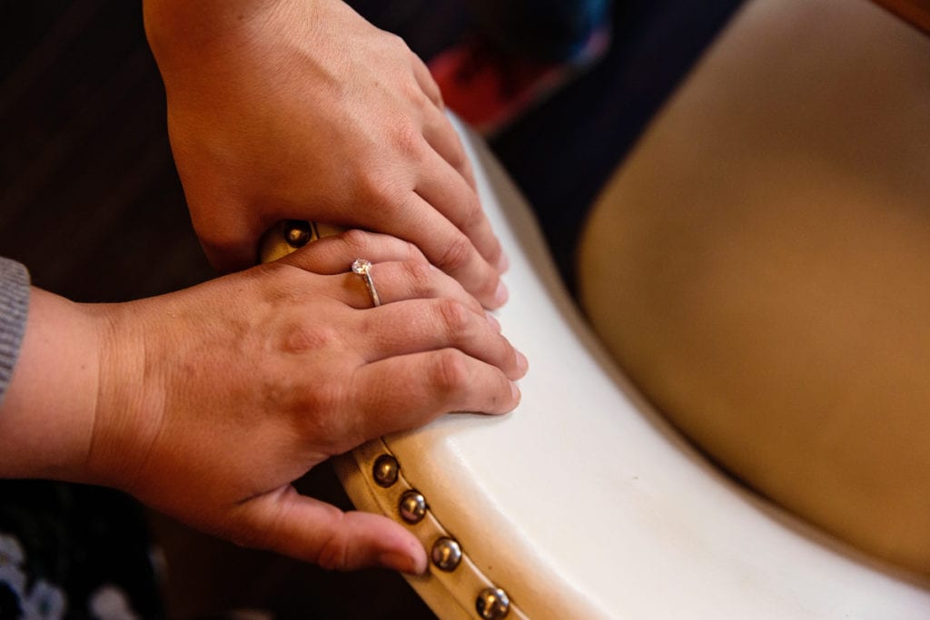 Fiances holding hands