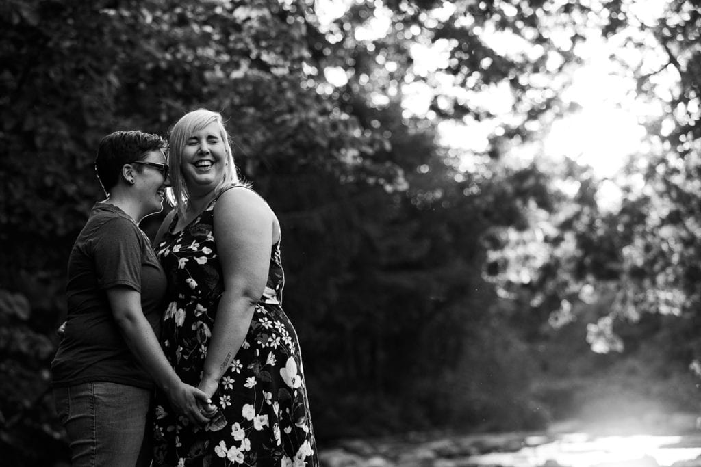 Smiling LGBT couple engagement