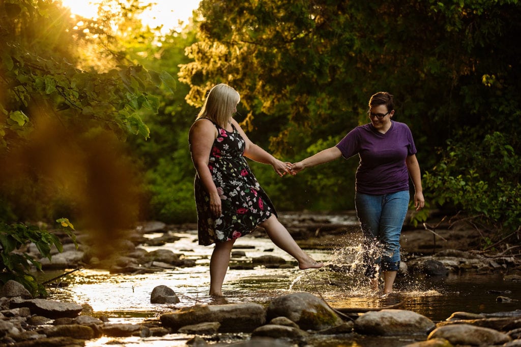 Couple splashing in eastern Ontario river