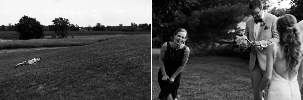 Little boy rolling down grassy hill at Intimate Strathmere Wedding