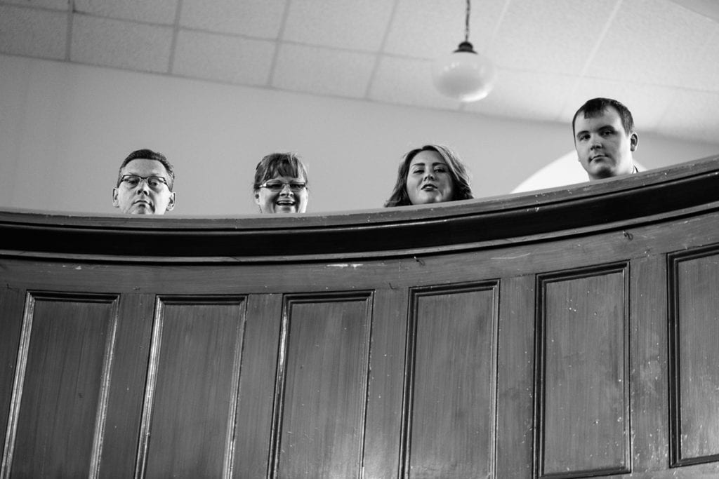 Wedding guests in balcony at wedding ceremony