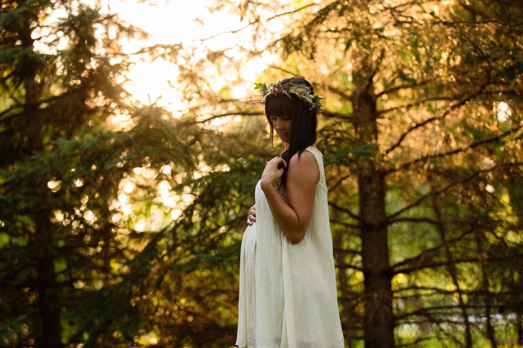 Bohemian mom in sunset nature maternity session