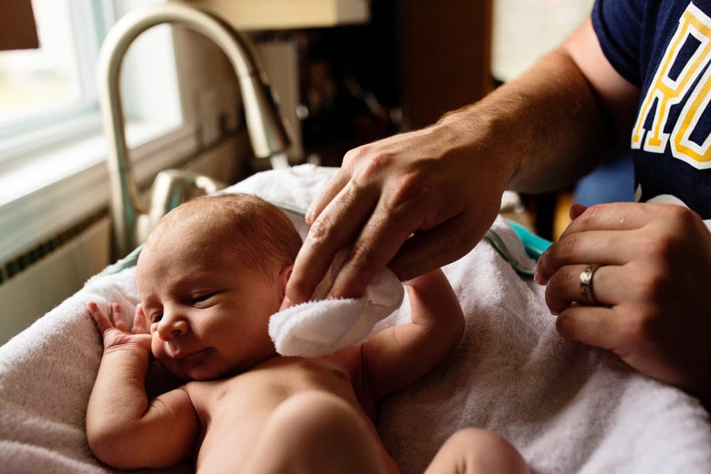 Newborn baby's first bath