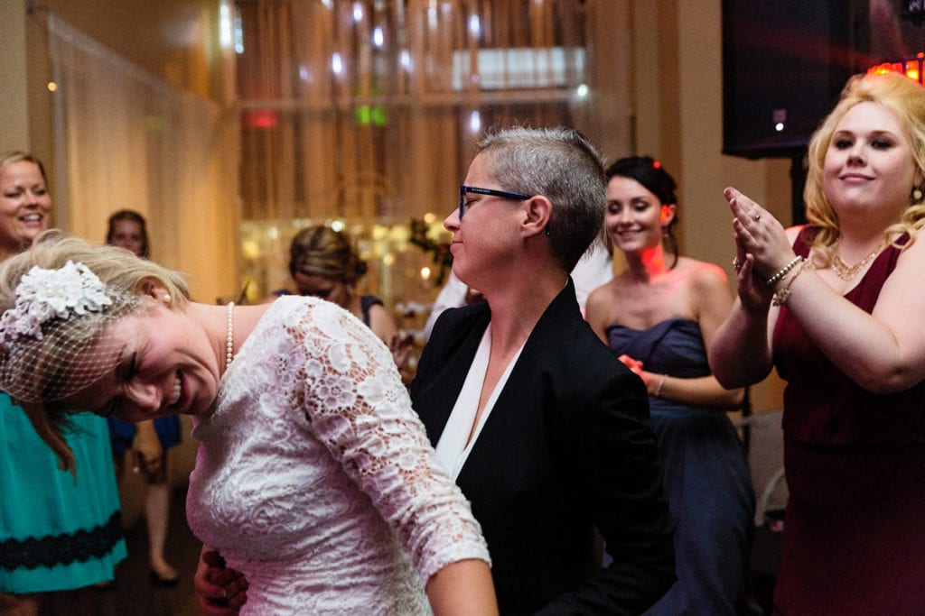 brides dancing at Cornwall chic LGBTQ wedding