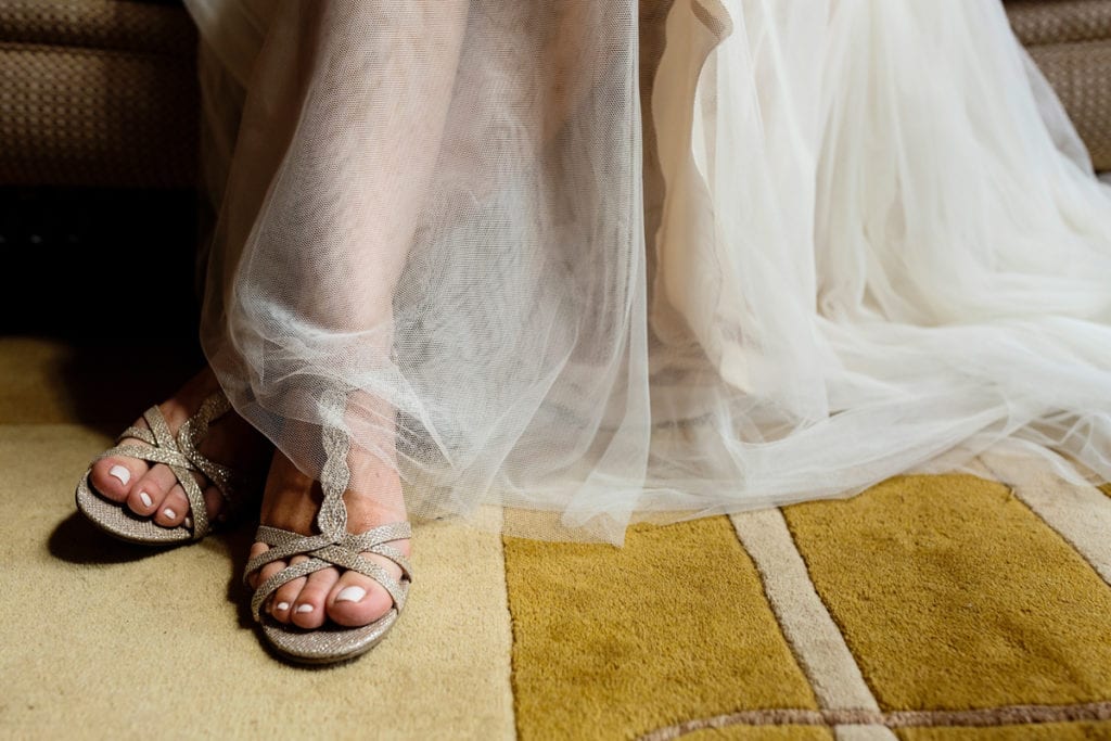 wedge wedding shoes and flowy wedding dress