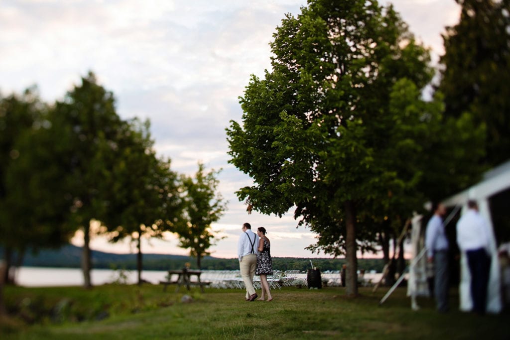 guests strolling the lakeside at intimate Calabogie wedding