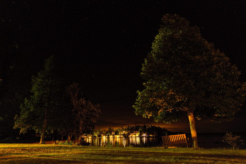 Calabogie Lodge at night from Barnet Cottage at intimate lakeside wedding