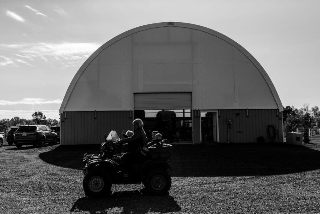 kids riding four wheeler with grandma during Cornwall storytelling photo session