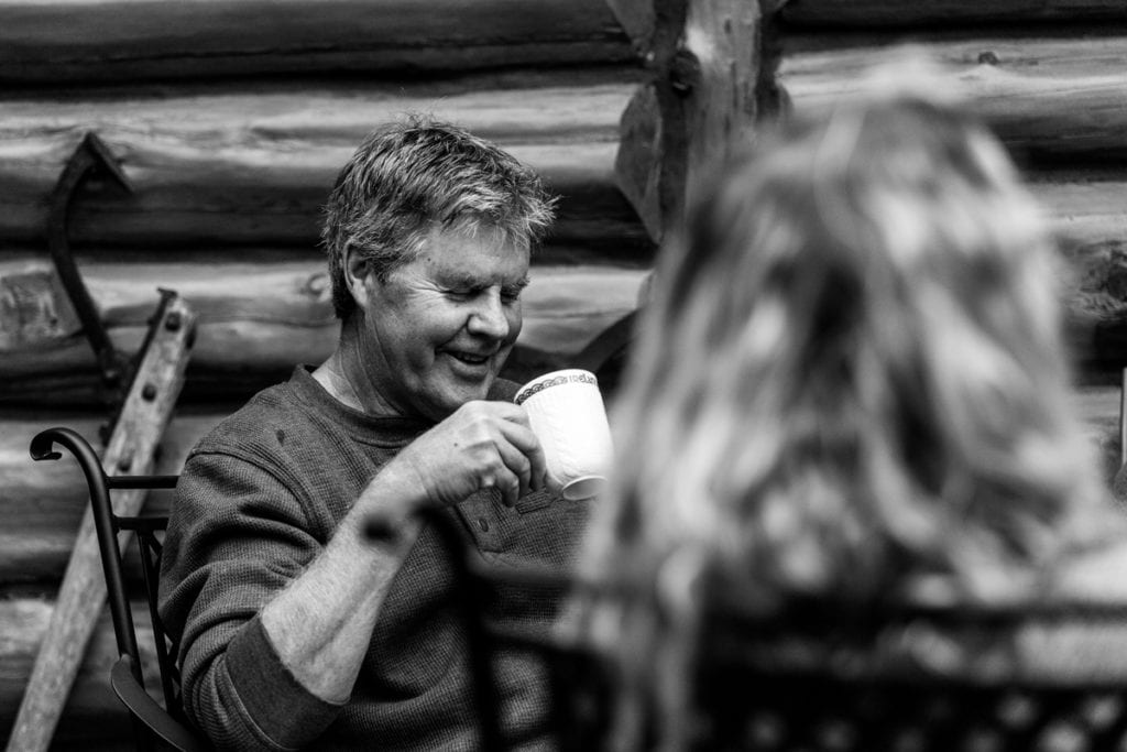 profile shot of dad enjoying coffee and family during casual ontario family session