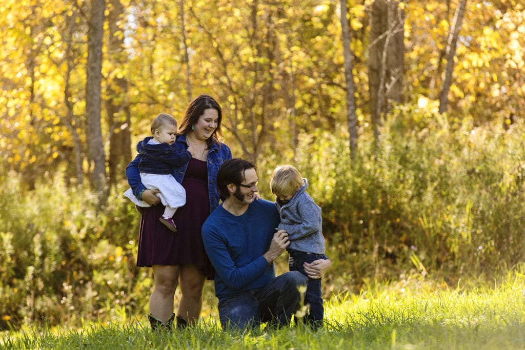 family dressed in blue for non-traditional fall family portrait session