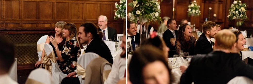 Dinner guests laugh boisterously during dinner reception at Rhinefield House