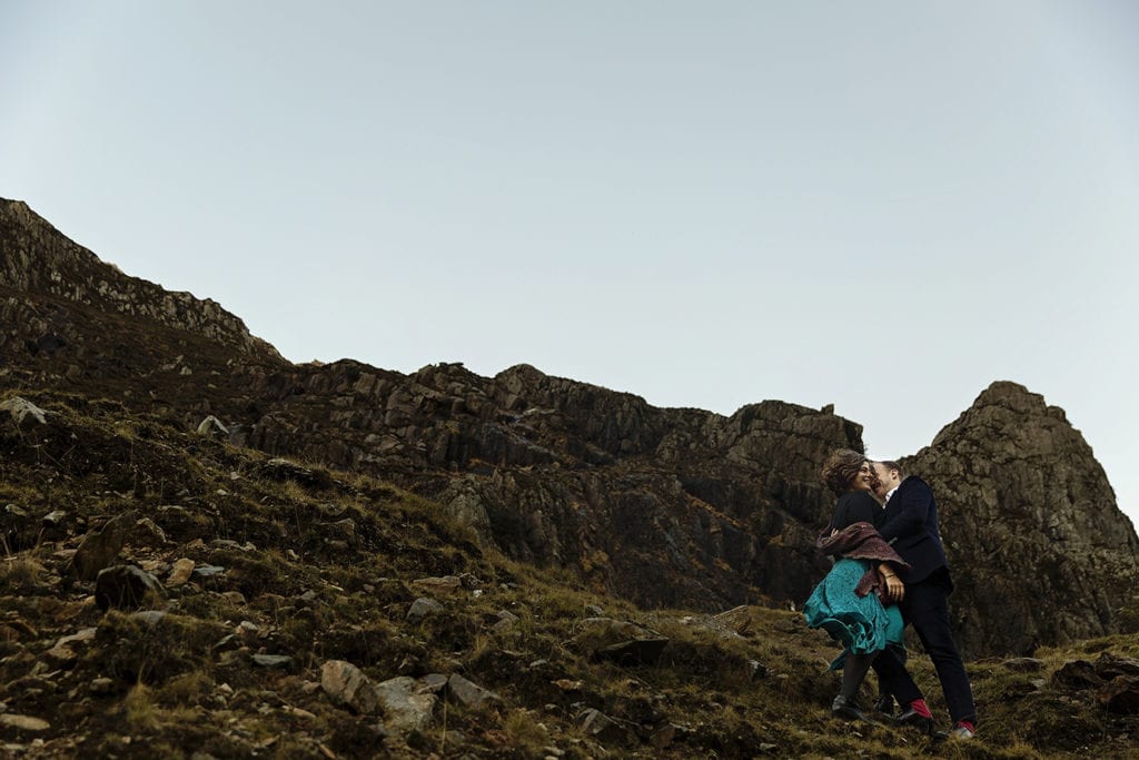 couple stand on mountainside for Snowdonia portrait session