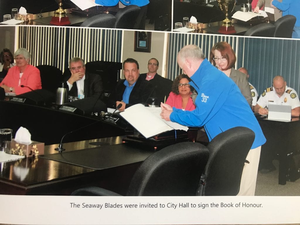 Cornwall family photographs - man signing book at City Hall